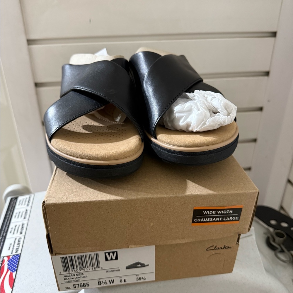 Clarks Women's Black and Tan Sandals